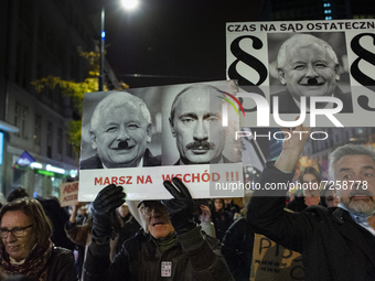 People take part in a demonstration against the abortion ban, in Warsaw, Poland, on October 22, 2021.  (