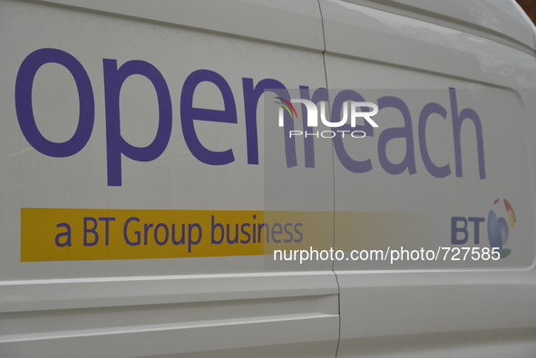 Light shining on a BT Openreach advert on Tuesday 5th May 2015. 