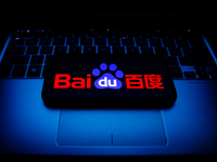 Baidu logo displayed on a phone screen and a laptop keyboard are seen in this illustration photo taken in Krakow, Poland on October 30, 2021...