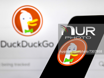 DuckDuckGo logo displayed on a phone screen and DuckDuckGo website displayed on a laptop screen are seen in this illustration photo taken in...