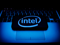 Intel logo displayed on a phone screen and a laptop keyboard are seen in this illustration photo taken in Krakow, Poland on October 30, 2021...