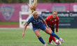 London City Lionesses' Mollie Rouse battles for possession with Durham Women's Beth Hepple...