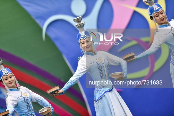 ORDOS, Aug 13, 2015 () -- Dancers from north China's Inner Mongolia Autonomous Region perform during a performance gala by all the ethnic gr...