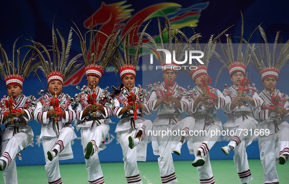 ORDOS, Aug 13, 2015 () -- Dancers from southwest China's Guizhou Province perform during the 10th National Traditional Games of Ethnic Minor...