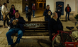 Locals taste the typical bread during the Sagra de 'la quartecèdde on the occasion of the...