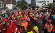 Readymade garment workers march towards Prime Minister Office as they protest demanding th...