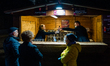 People wait to taste the primitive wine during the Bacco for Bacco festival in the histori...