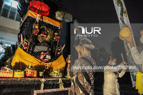 Hindu-Balinese people offering prayers during the Galungan Hindu festival at Pura Agung Raksa Buana on November 10, 2021 in Medan, Indonesia...