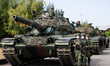 Soldiers patrol as Tanks are deployed during a shore defense operation as part of a milita...