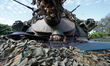 A soldier is seen on a tank during a shore defense operation as part of a military exercis...