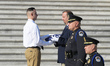 Former Sentinels fold the US Flag during a Ceremony for the 100th Anniversary of the Tomb...