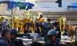 Officers inspects the site of the bomb blast at the Erawan Shrine in Bangkok, Thailand on...
