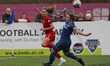Liverpool's Leanne Kiernan gets the ball away despite interference from Durham Women's Sar...