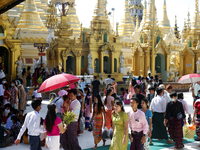 Buddhist devotees visit Shwedagon Pagoda during the full moon day of Tazaungmon, the eighth month of the Myanmar calendar, in Yangon, Myanma...
