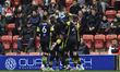  Isaac Olaofe of Sutton United celebrates with his team mates  after scoring his team's fi...