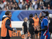 Maëlle FILOPON of France and coach Stephane EYMARD during the half-time during the international women's rugby match between France and New...