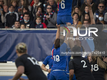 Gaëlle HERMET of France is lifted on a line-out by Clara JOYEUX and Celine FERER during the international women's rugby match between France...