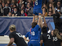 Gaëlle HERMET of France is lifted on a line-out by Clara JOYEUX and Celine FERER during the international women's rugby match between France...