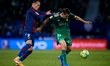 Ante Budimir (R) of CA Osasuna competes for the ball with  Francisco Javier Hidalgo 'Son'...
