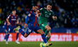 Ruben Vezo (L) of Levante UD competes for the ball with Ante Budimir of CA Osasuna during...