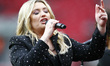  Singer Ella Henderson perform before the  Vitality Women's FA Cup Final 2021 between Arse...