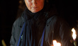 People participate in a candle rally in L'Aquila on April 6, 2014 to commemorate the fifth...