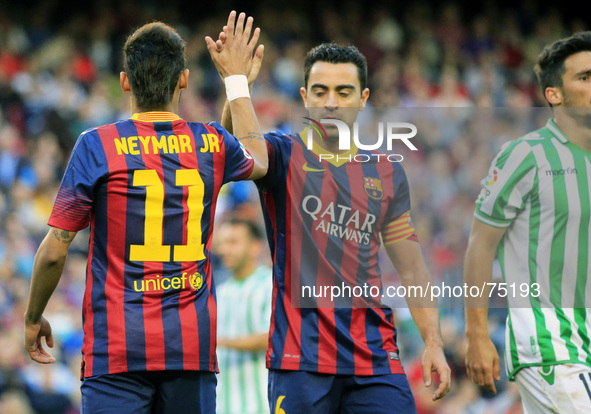 Neymar Jr. and Xavi Hernandez in the match between FC Barcelona and Betis  for the week 32 of the spanish league, played at the Camp Nou on...