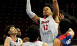 Japan's JR Sakuragi (12) goes up for the basket during their second round match of the FIB...