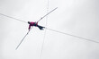 French tightrope walker Denis Josselin crossed the Seine on a steel wire 16 mm, in Paris,...