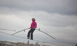 French tightrope walker Denis Josselin crossed the Seine on a steel wire 16 mm, in Paris,...