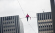 French tightrope walker Denis Josselin crossed the Seine on a steel wire 16 mm, in Paris,...
