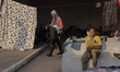 Members of the Central American migrant caravan in the facilities of the Casa Peregrino lo...