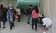 Members of the Central American migrant caravan in the facilities of the Casa Peregrino lo...