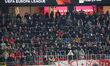 Fans and supporters of Antwerp in the stadium wearing facemask due to Covid-19 Coronavirus...
