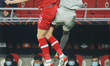 Oleg Reabciuk #45 of Olympiakos and Ritchie De Laet #2 of Antwerp in the air during the Eu...