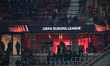 Screen with the logo inscription of UEFA EUROPA LEAGUE with fans in the stadium during the...
