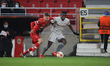 Mohamed Mady Camara #4 of Olympiakos and Pieter Gerkens #16 of Antwerp during the Europa L...