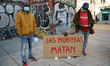 Protesters during a protest on the occasion of Migrants Day, in the Plaza Juan Goytisolo,...