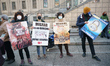 Protesters during a protest on the occasion of Migrants Day, in the Plaza Juan Goytisolo,...
