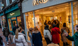Crowds at non-essential stores at the shopping district in Amsterdam, because a hard lockd...