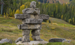 An inuksuk, a manmade stone landmark built for use by the Inuit, Iñupiat, Kalaallit, Yupik...