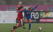 Durham Women's Bridget Galloway battles for possession with Blackburn Rovers' Natasha Fent...
