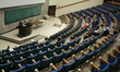 Students wait for their class to begin in a university lecture hall in Ontario, Canada. 