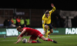 Jack Rudoni of AFC Wimbledon is fouled by Ryan Williams of Oxford United during the Sky Be...