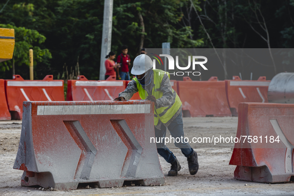 Employees work at the facilities of the Mayan Train tracks in section 5 in the state of Quintana Roo. On December 21, 2021 in Playa del Carm...