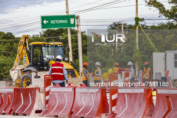 Employees work at the facilities of the Mayan Train tracks in section 5 in the state of Quintana Roo. On December 21, 2021 in Playa del Carm...
