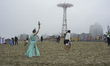 People participate in the annual Polar Bear Plunge in Coney Island in the Brooklyn borough...