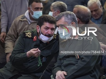 Iranian Commander of Great Tehran's Mohammad Rasoolullah Corps, Hassan Hassanzadeh (L) gestures as he speaks with the Iranian Commander of A...