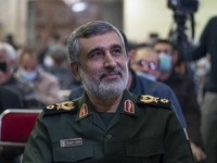 Iranian Commander of Aerospace Force of the Islamic Revolutionary Guard Corps (IRGC), Amir Ali Hajizadeh, smiles while attending a death ann...