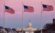 The sun sets over the US Capitol following an unexpected snowstorm that dumped roughly 8 i...